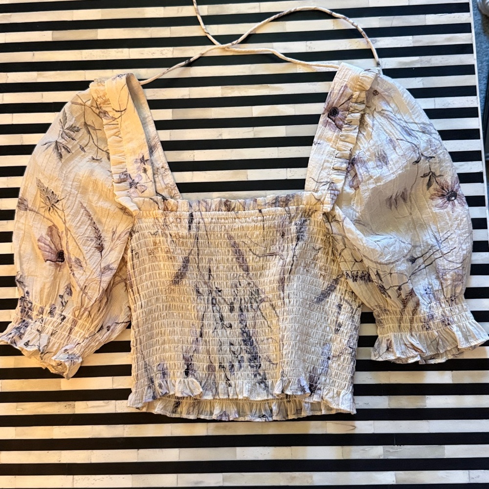Crop smocked floral top. Ties in the top in the back.